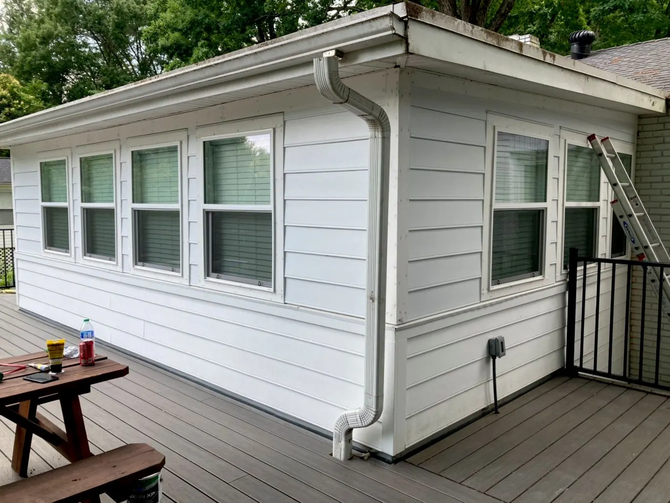 The same sunroom repainted entirely white